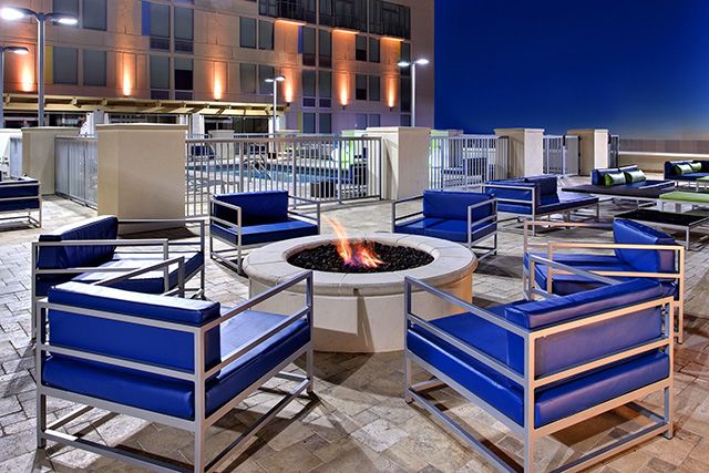 Head to the roof for drinks around the firepit at night...